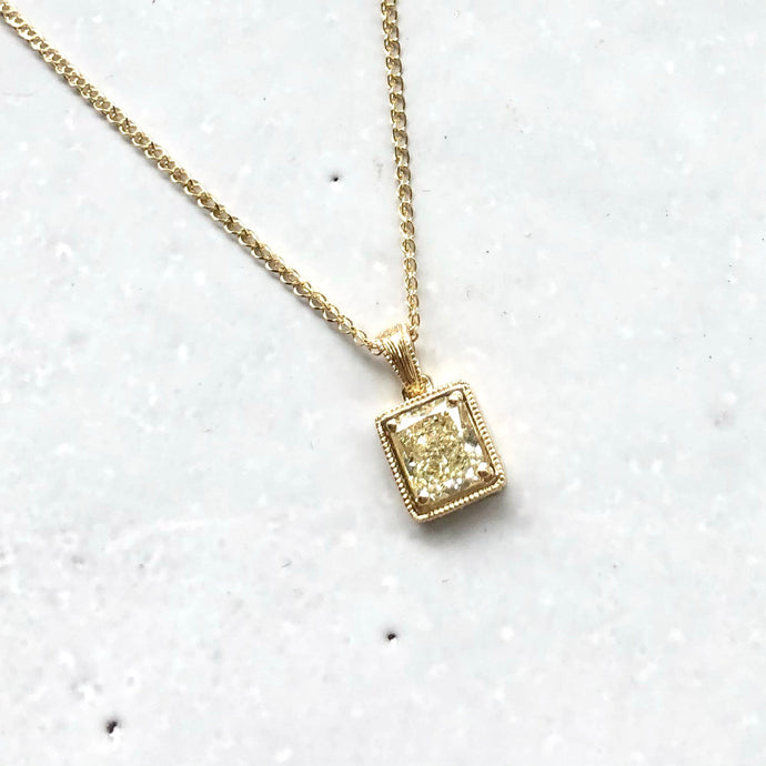 Upcycling a special cut yellow diamonds from earrings to engraved charms